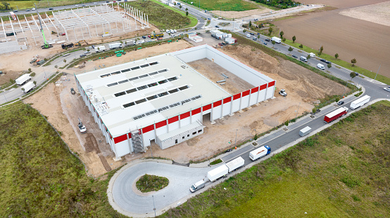 Large construction site - industrial buildings. Aerial view, drone point of view.