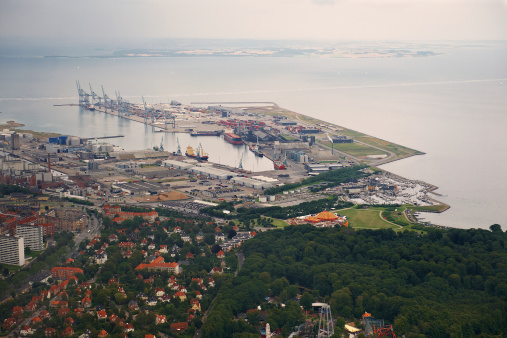 City from above with industry, trainstation and harbor