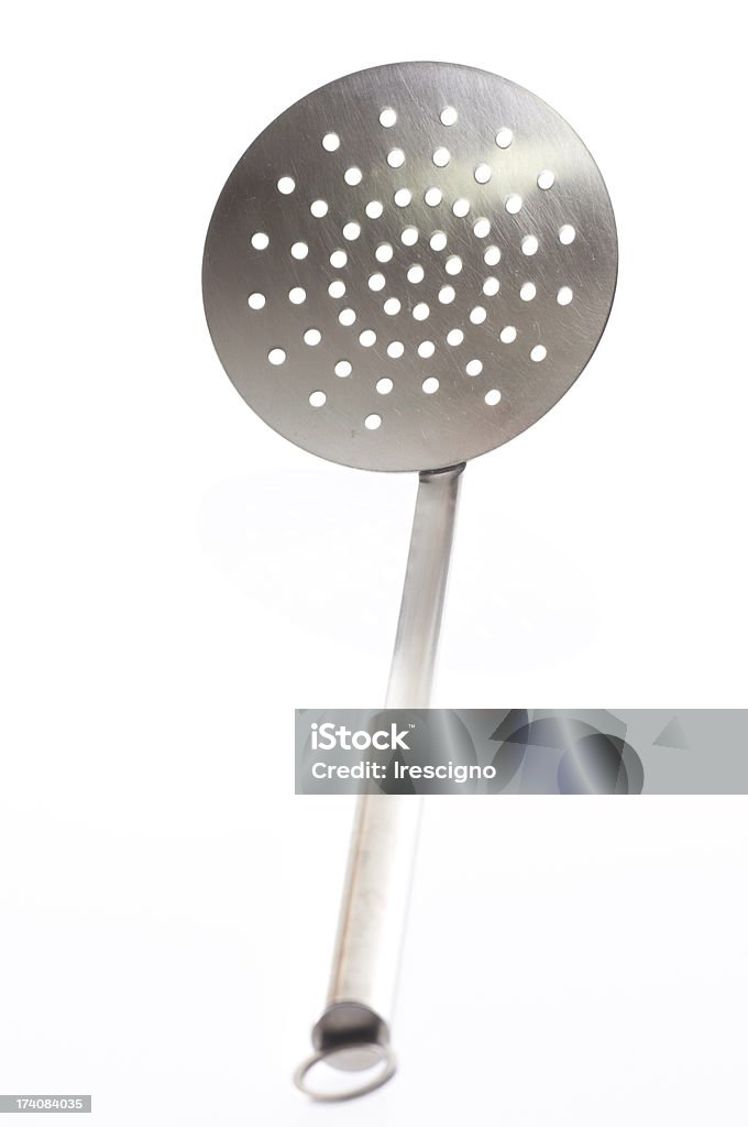 Scanalato cucchiaio-Utensile da cucina - Foto stock royalty-free di Cucchiaio