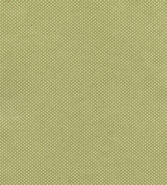 istock faded green paper with polka dots 174084728