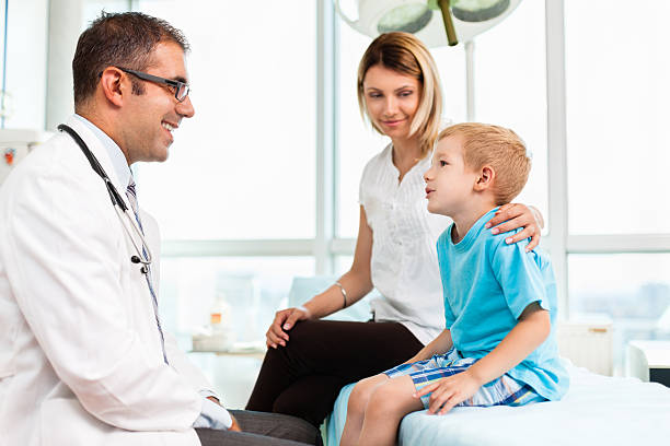 istock Mother and child visiting doctor 174084977
