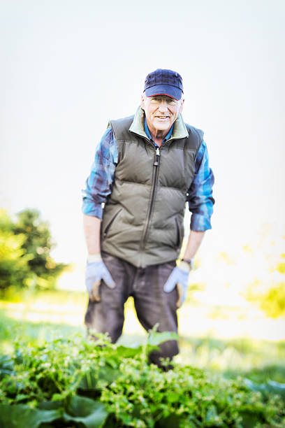 istock Farmer looks up and smiles 174085017
