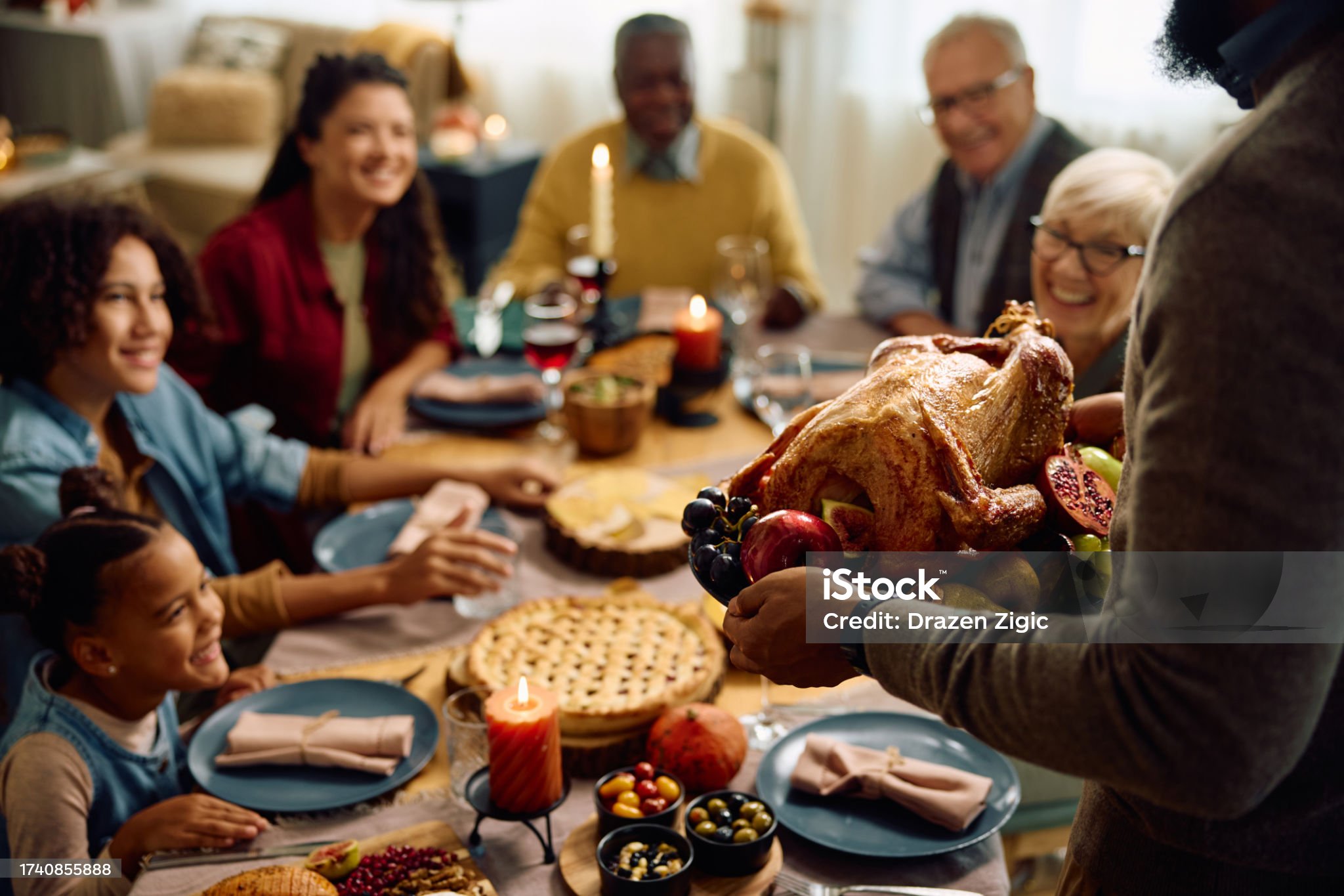 Family enjoying Thanksgiving dinner