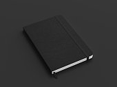 Black cover notebook mockup on gray background