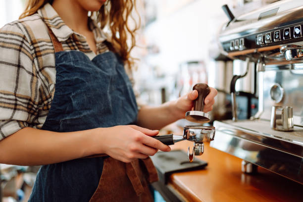 istock An experienced female bartender prepares a hot drink. 1740905299