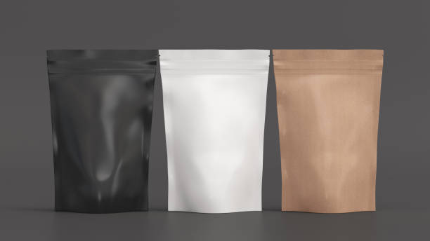istock Black, craft and white packaging pouches mockup for tea, coffee, snack on gray background 1740906564