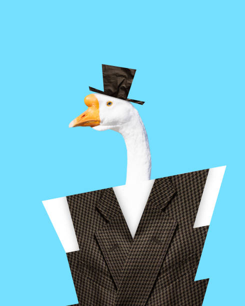 istock Gentleman. Goose wearing classical suit vest and cylinder hat over blue background. Contemporary art collage. 1740911784