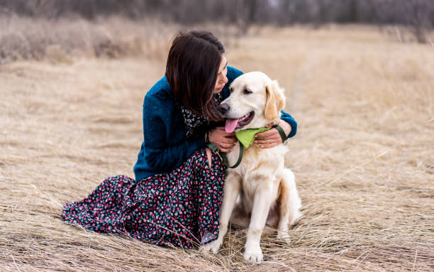 istock Dog with woman outside 1740913023