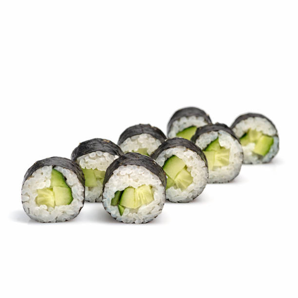 sushi roll with cucumber on white background.