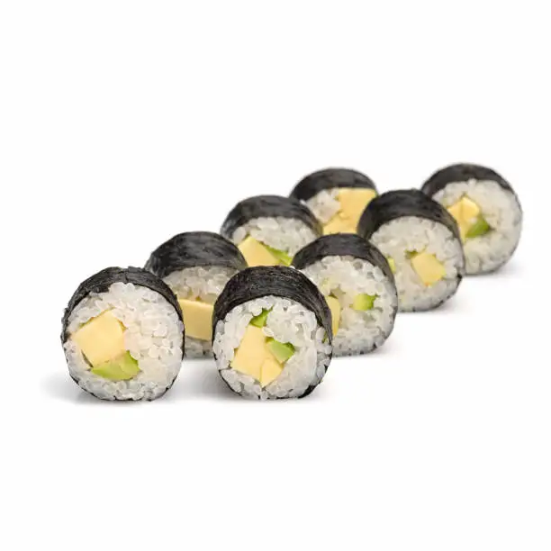 Photo of Maki sushi roll with avocado on white