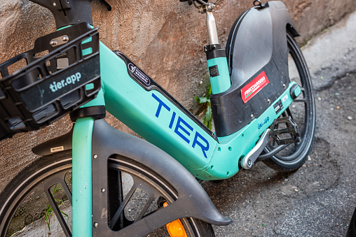 Rome, Italy - February 15, 2023: Electric Rental Bikes Scattered Around The Rome Sidewalks