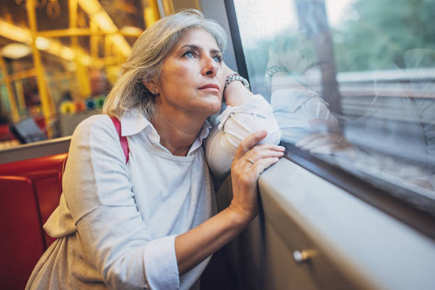 istock Woman riding in public train 1740938788