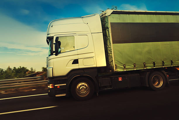 istock semi-truck on the highway 174094396