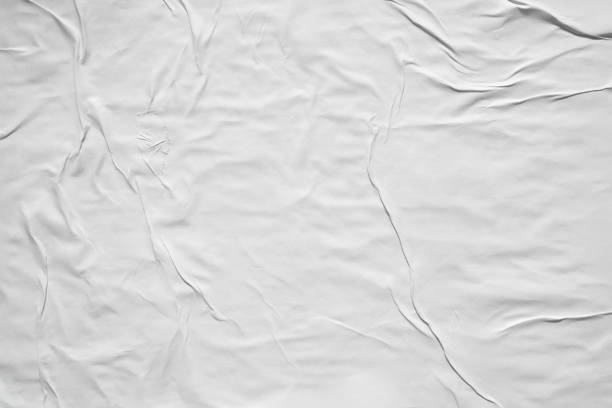 istock Glued white paper poster texture background 1740963958