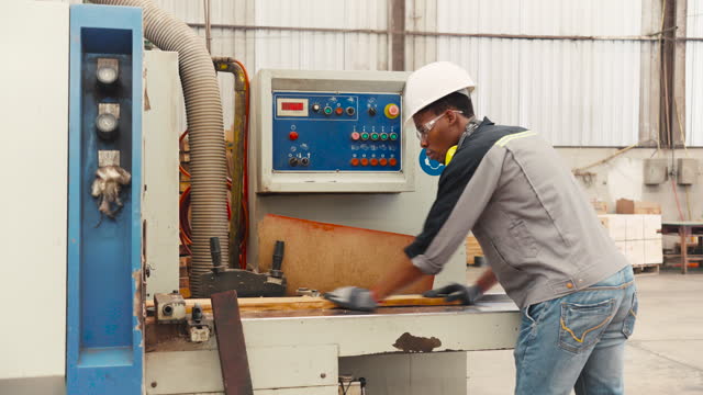 Carpenter uses large industrial machinery. For polishing wood faces and cut the wood into pieces for storage and export