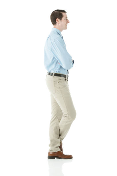 istock Side view of a businessman posing against white 174102601