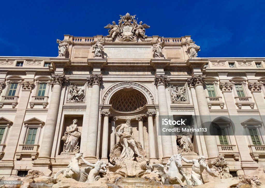The Trevi Fountain. The detail of Trevi Fountain at Rome, Italy. It is one of Rome's most popular tourist attraction. Ancient Stock Photo