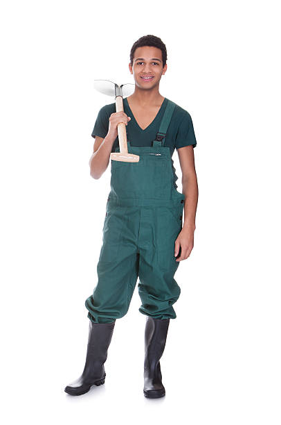 istock Happy young gardener in dungarees 174104227