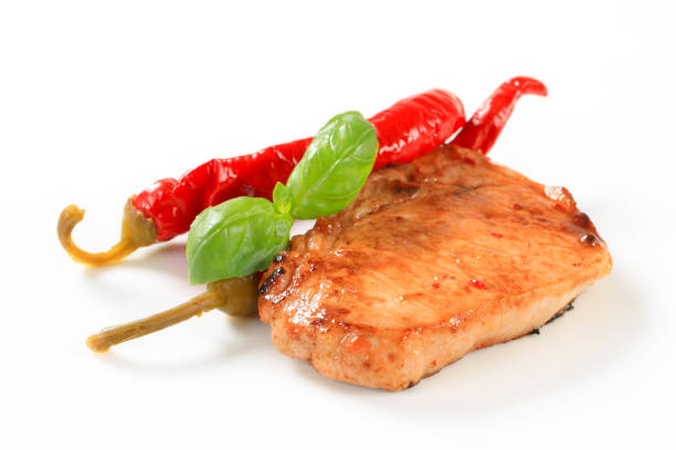 istock Pan-fried pork chop with chili peppers 174105565