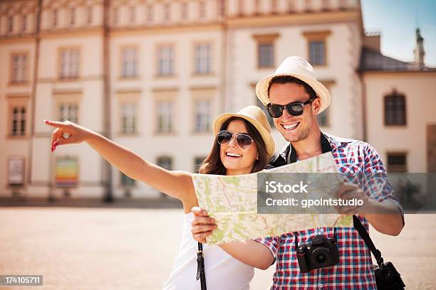 Happy Tourist Sightseeing City With Map Stock Photo - Download Image Now - Couple - Relationship, Travel, Tourist