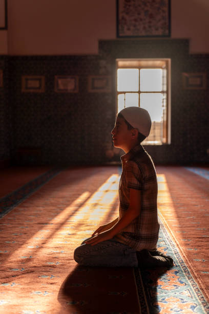 istock A boy praying in a mosque. 1741063223