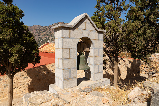 Bell at the Church of Saint Panteleimon on Spinalonga, Crete, Greece.