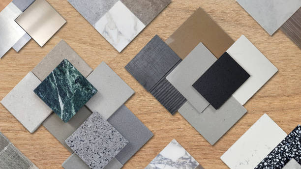 istock samples of interior material contains ceramic tiles, artificial stones, marbles, stainless, quartz, terrazzo placed on wood table. interior design selected material for idea. 1741082706