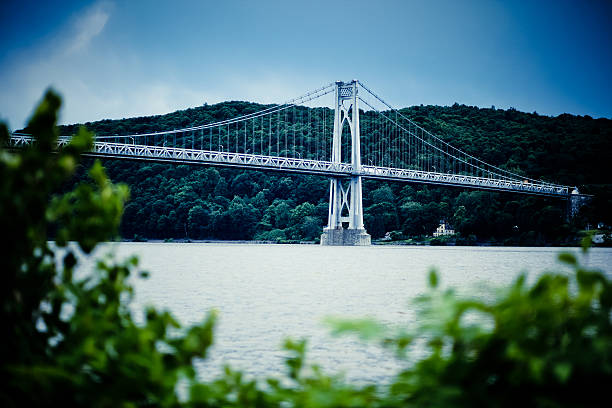 Bridge against blue sky stock photo
