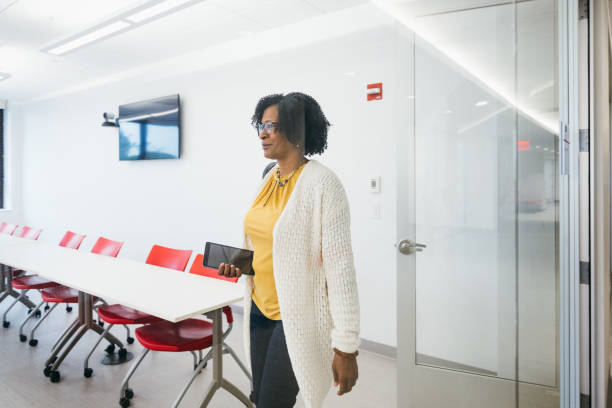 istock Teacher arriving to University 1741084343