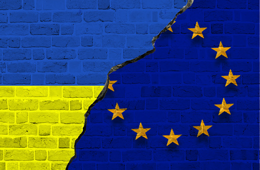 istock Flags of Ukraine and European Union flag together. The conflict between the European Union and Ukraine. 1741089594