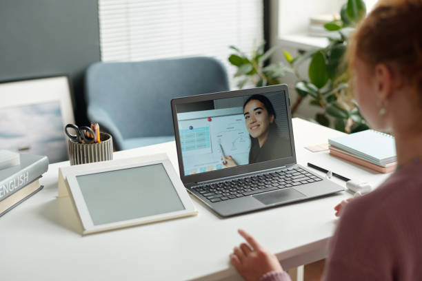 istock Focus on laptop screen with English teacher explaining new grammar rules 1741111547