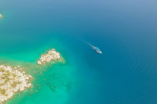 drone view of turquoise seagoing boat