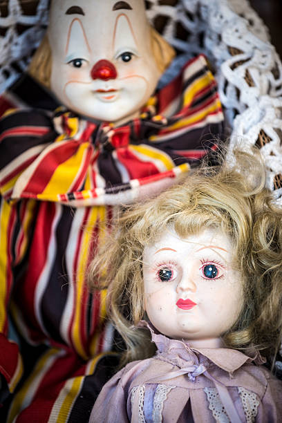 istock Scary antique doll and puppets in flea market 174113236