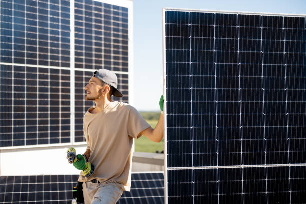 Free Stock Photo of Engineer in charge of solar panel installation ...