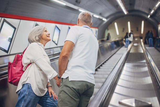 istock Mature couple riding on escalator 1741142659