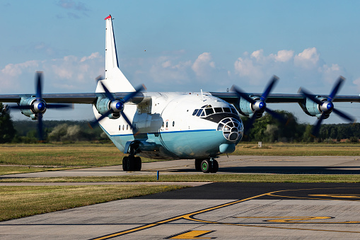 Untitled cargo plane at airport. Aviation industry and aircraft. Air transport and flight travel. International transportation. Fly and flying. Creative photography. Commercial theme.