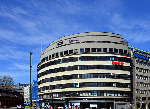 Oslo, Norway: Doblouggården office building from 1933 - the first commercial building in Oslo built in reinforced concrete, with curved, horizontal window bands. The building was designed by the German-Jewish architect Erich Mendelsohn in functionalism style and built under architect Rudolf Emanuel Jacobsen for Brødrene Dobloug by Ingar Dobloug. The main contractor was Thor Furuholmen - located on Dronningens Gate.