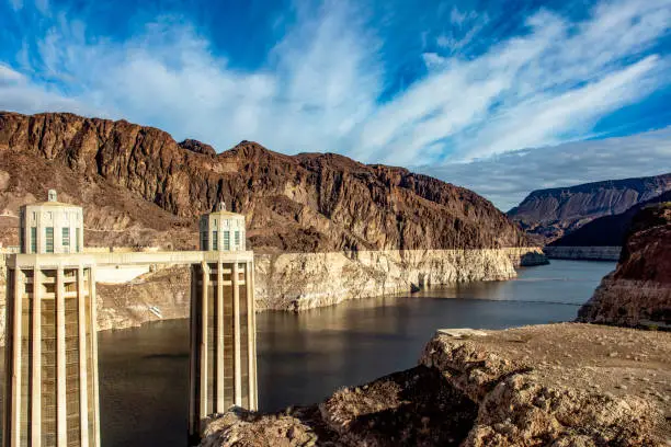 Photo of Panoramic view of the mythical Hoover Dam, between mountains on the course of the Colorado River on the border between the states of Arizona and Nevada in the United States of America.