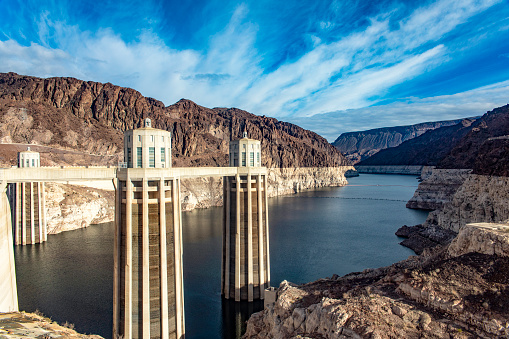 Hydro-generators at the Hoover Dam, located between mountains on the Colorado River on the border between the states of Arizona and Nevada in the United States of America.