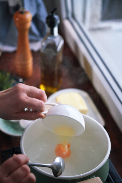 Preparing Poached Eggs in Domestic Kitchen