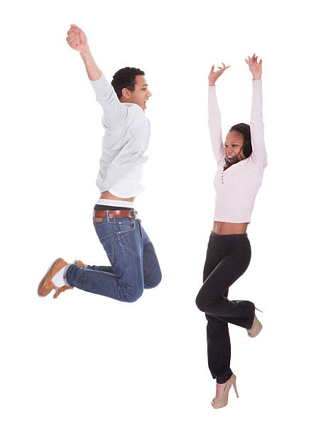 istock Young Couple Jumping In The Air 174119361