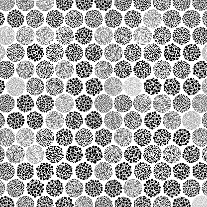Unveiling a fascinating geometric design, this image showcases a honeycomb pattern where each hexagon morphs into a circle filled with small, non-overlapping dots. The meticulous arrangement of dots within each circular space presents a harmonic consistency, while the varied size of the circles adds a level of complexity and visual interest. The juxtaposition of geometric shapes—hexagons and circles—offers a unique take on pattern design, creating a visually stimulating and modern aesthetic. This engaging pattern could serve as a compelling backdrop or design element, embodying both structure and whimsy.