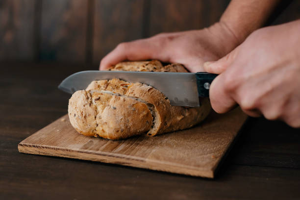 istock Fresh bread on the kitchen table The healthy eating and traditional bakery concept 1741244879