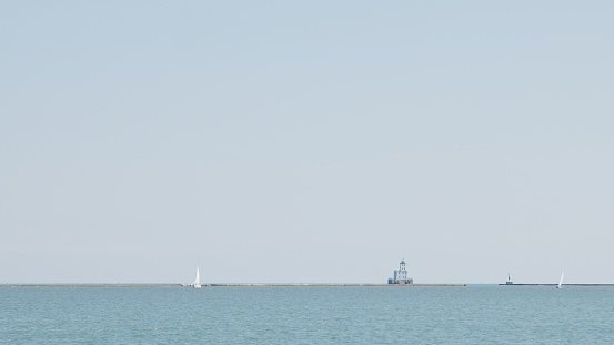 Sailboat and Lighthouse in Milwaukee, WI