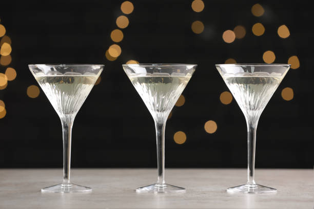 istock Martini glasses of refreshing cocktails on light grey table 1741325240