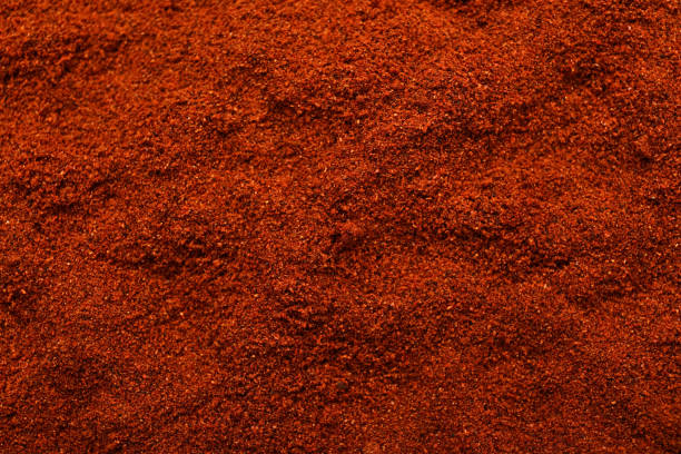 istock Aromatic paprika powder as background, top view 1741325891