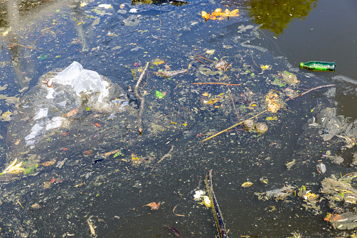 River pollution, background with copy space, full frame horizontal composition