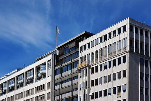 Oslo, Norway: façade of the Wilhelm Wilhelmsen office building, completed in 1960 - architects Arnstein Arneberg and Frithjof Stoud Platou - named after Morten Wilhelm Wilhelmsen, or simply Wilh. Wilhelmsen a Norwegian shipowner, consul and mayor, founder of Wilh. Wilhelmsen Holding ASA, a Norwegian maritime industry company. It is Norway's largest company within maritime operations and one of the largest in the world - The company was headquartered here 1960-1995 - located at Olav Vs gate and Dronning Mauds gate.