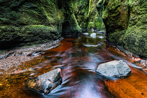 Finnich Glen and the Devil's Pulpit at the Finnich Gorge in Scotland. A stunning landscape feature and popular filming location for Outlander.