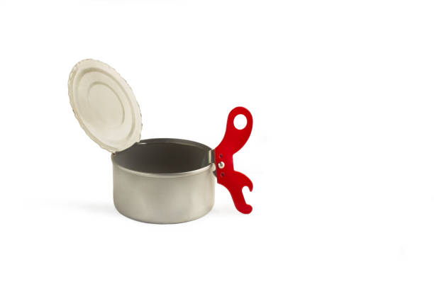 Senior opening a can of food